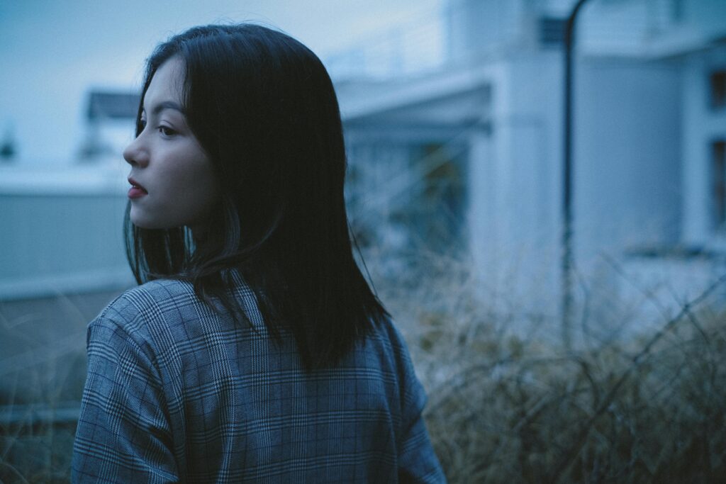 woman standing outside looking out curiously: What Are Amphetamines?| North star treatment