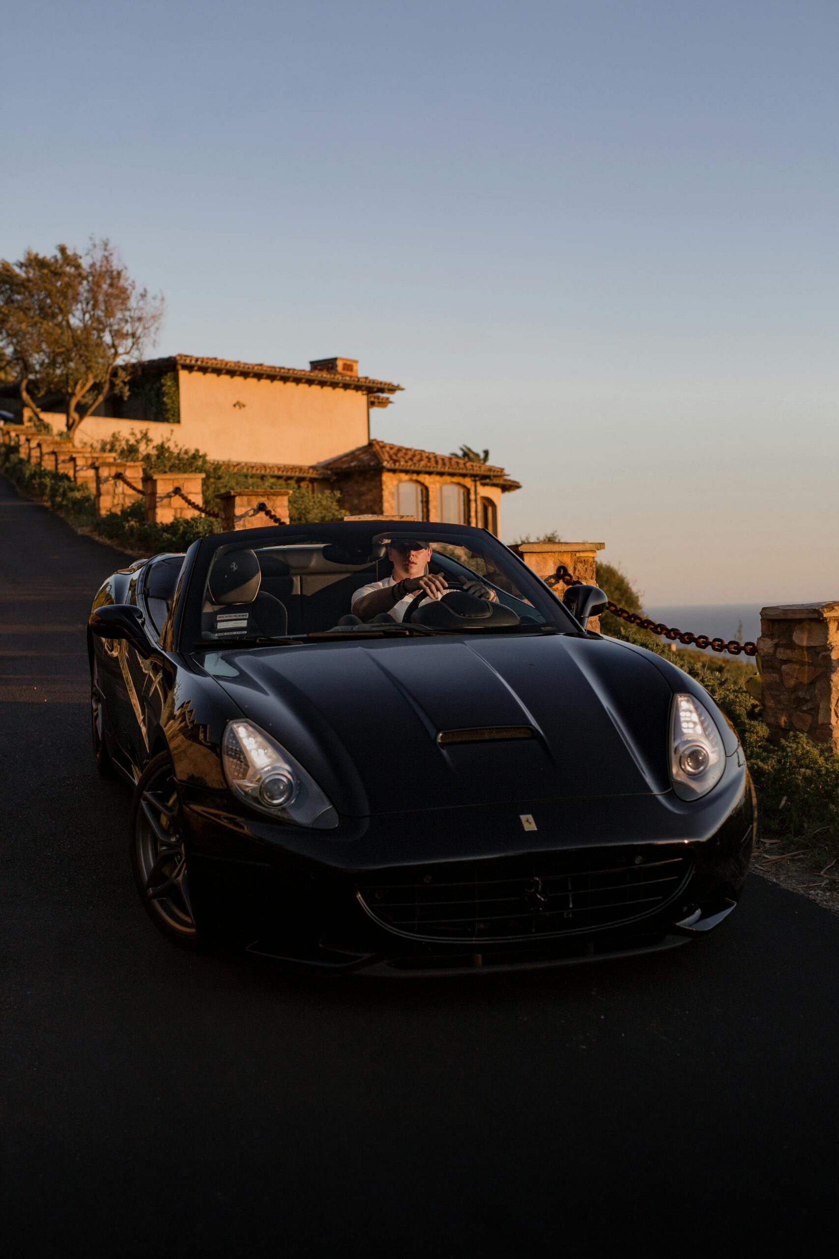 Luxury California rehab lifestyle with upscale coastal estate and luxury vehicle representing private addiction treatment, executive rehab care, and high end recovery accommodations in California.